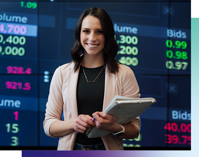 Business student in front of a financial market display, illustrating finance degree and double major opportunities