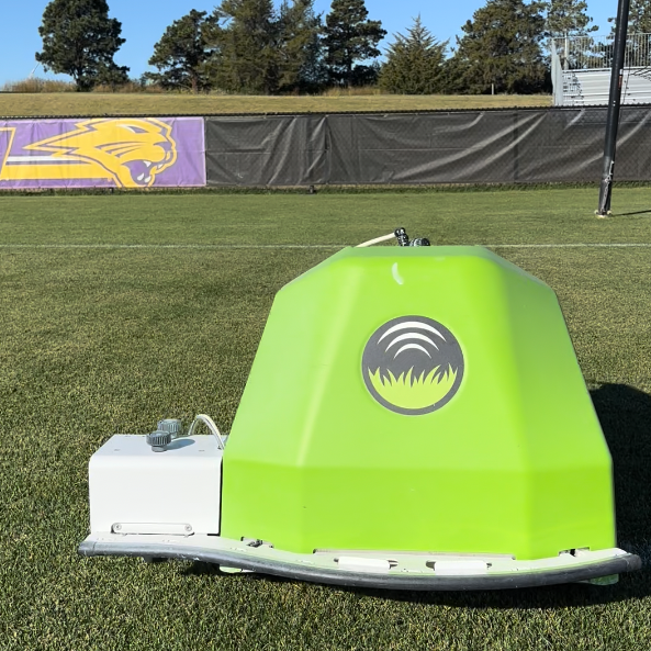 Paint robot featured on UNI soccer field.