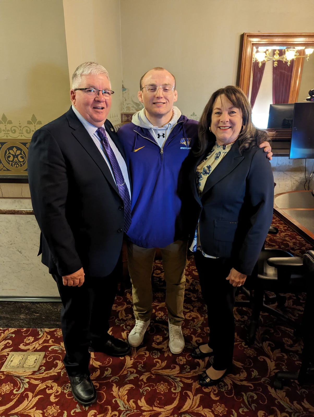 Parker Keckeisen with Sen. Dan Zumbach and Sen. Annette Sweeney