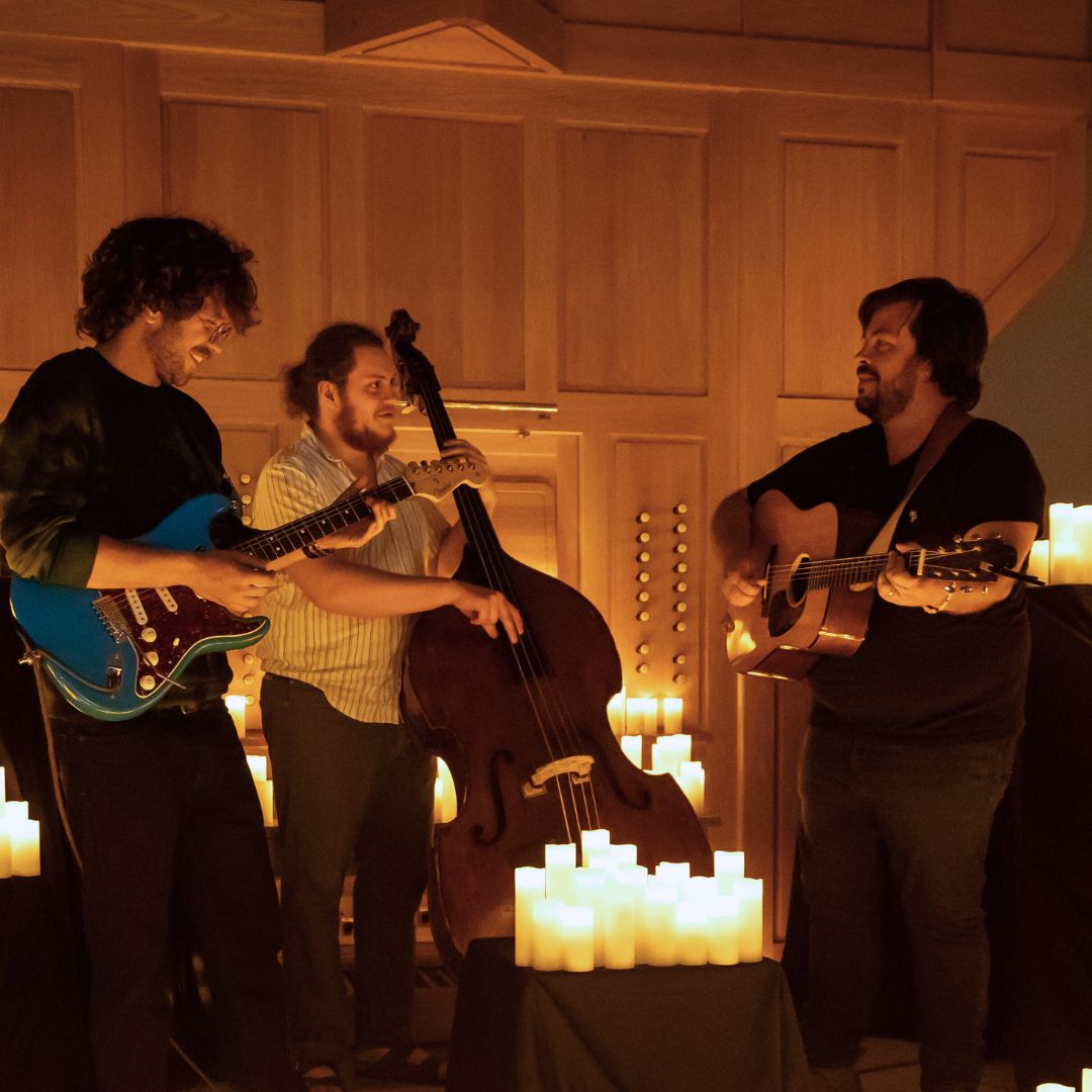 Musicians playing by candlelight