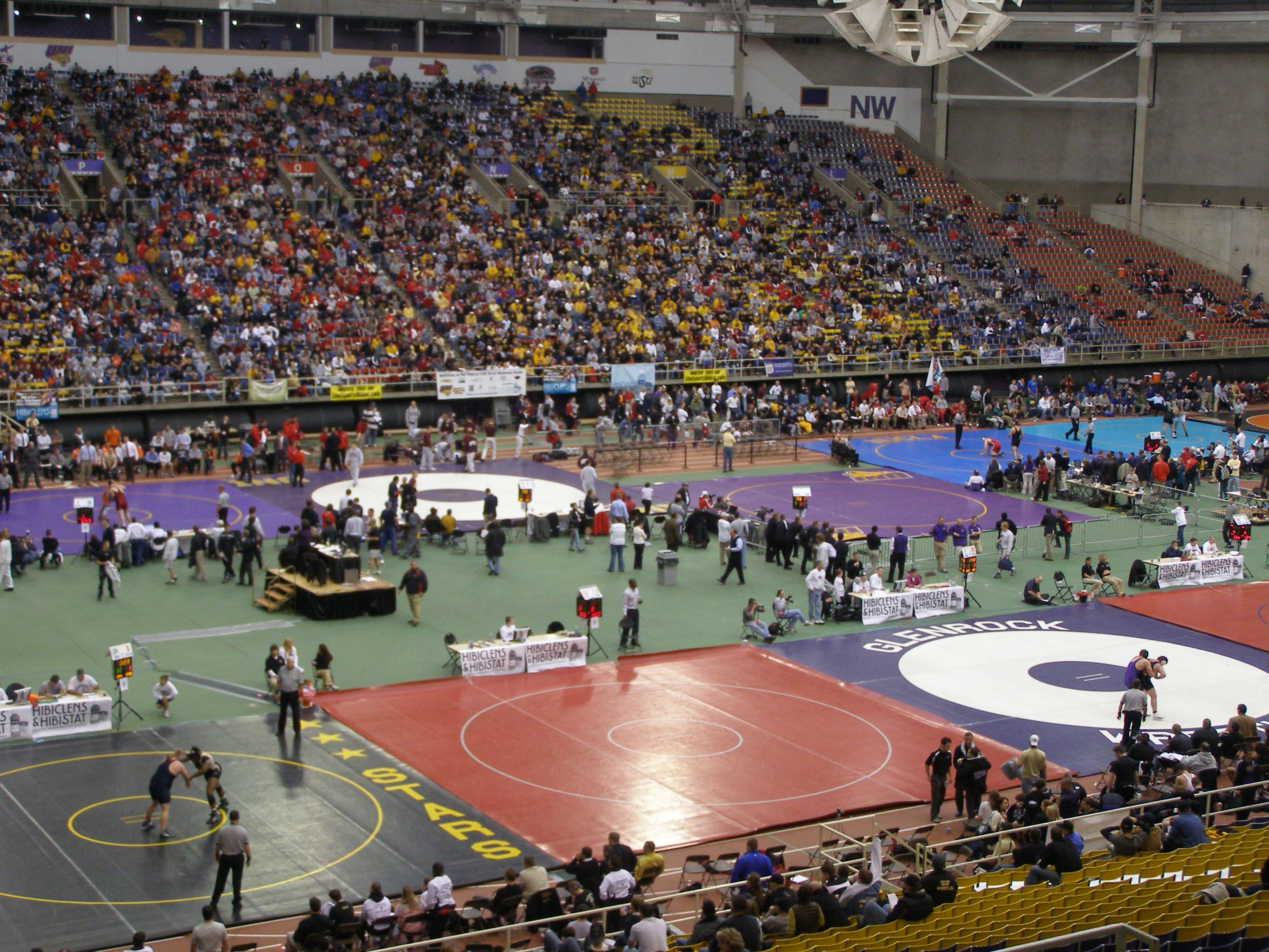 Inside the UNI-Dome while wrestlers are dualling