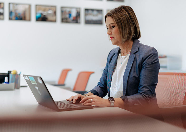 MBA student work on computer