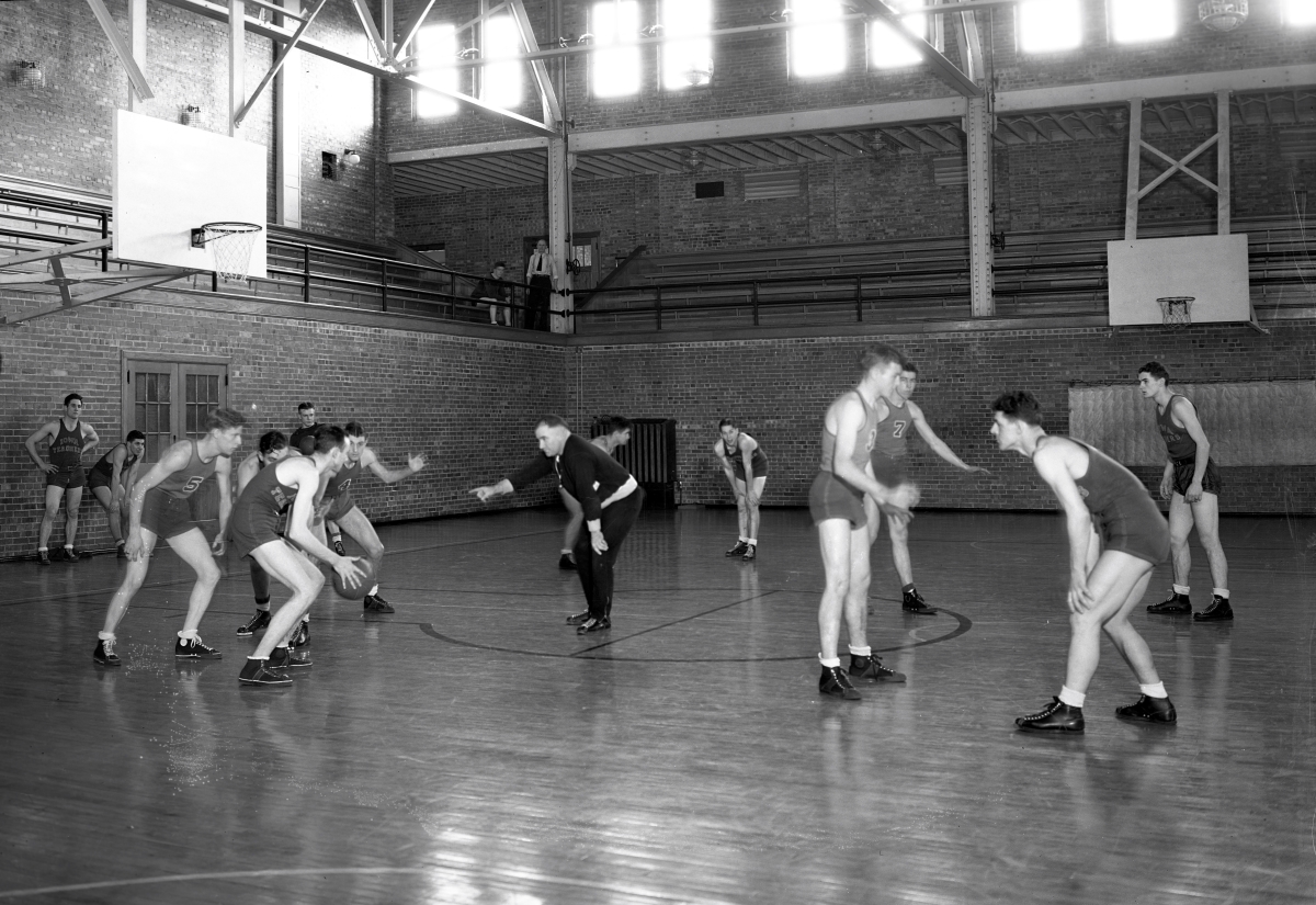 UNI students playing basketball in the West Gym