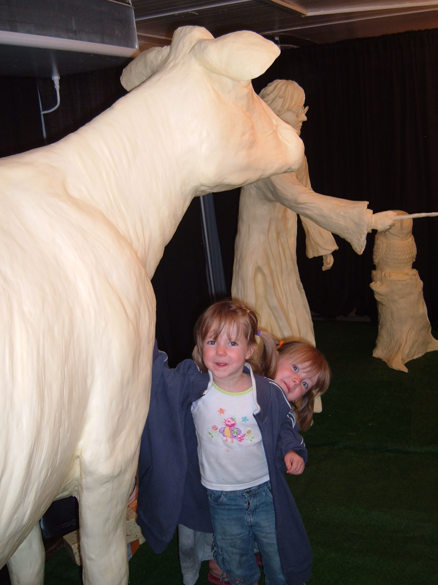 Young Hannah and Grace Pratt with the Butter Cow