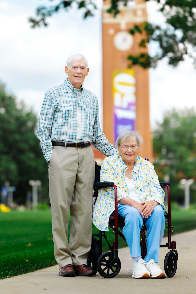Retired faculty Len Froyen and wife and fellow alum Gail on central campus at UNI 