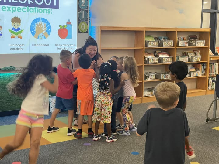 Katie Seavey with a group of elementary class students 