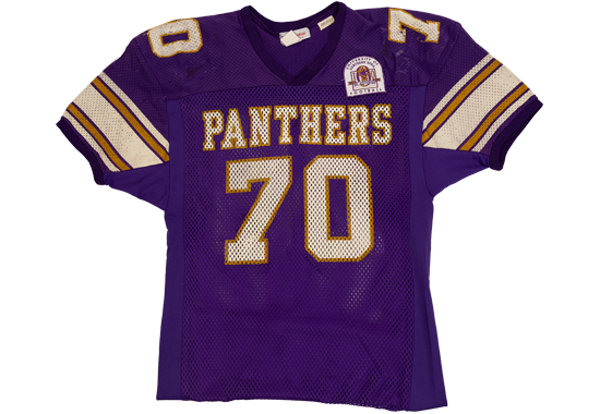 A purple UNI football jersey