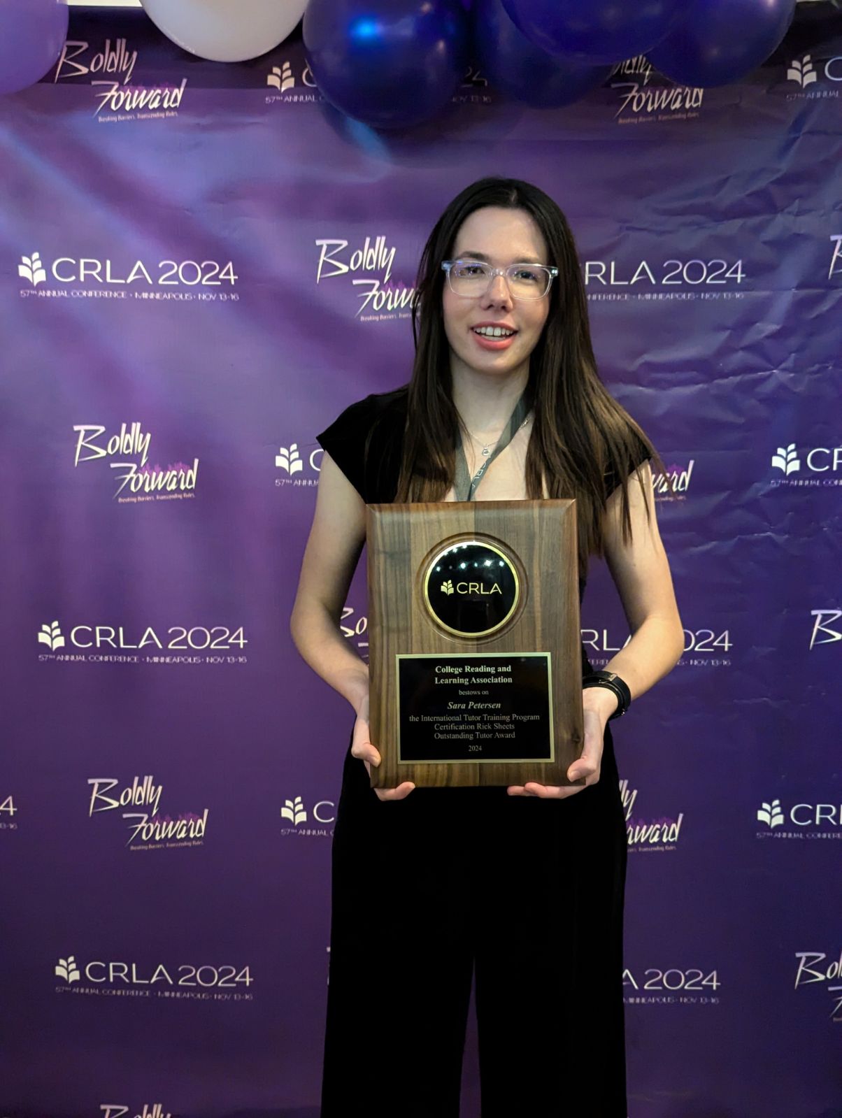 Sara Petersen with award