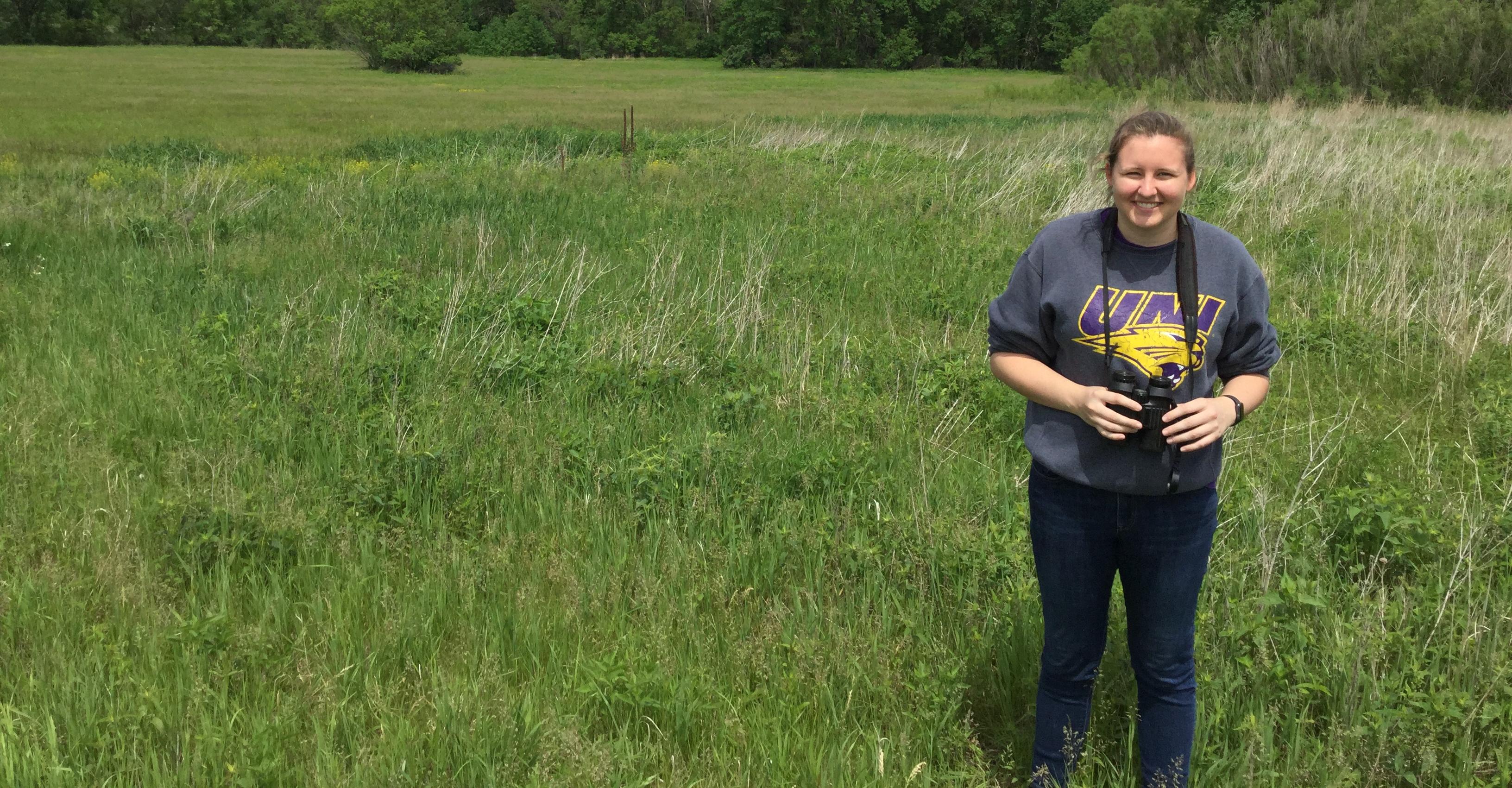 Gretchen Steffensmeier in the field collecting research.