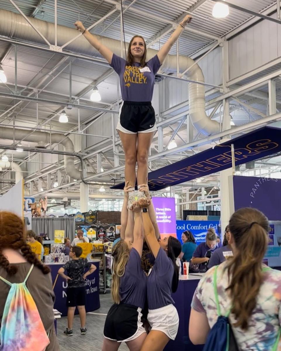 UNI Cheer in a pyramid