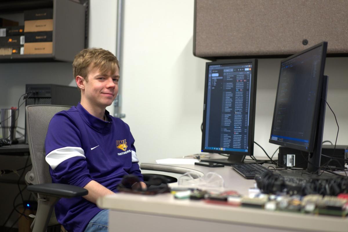 Jacob ODell with two computers