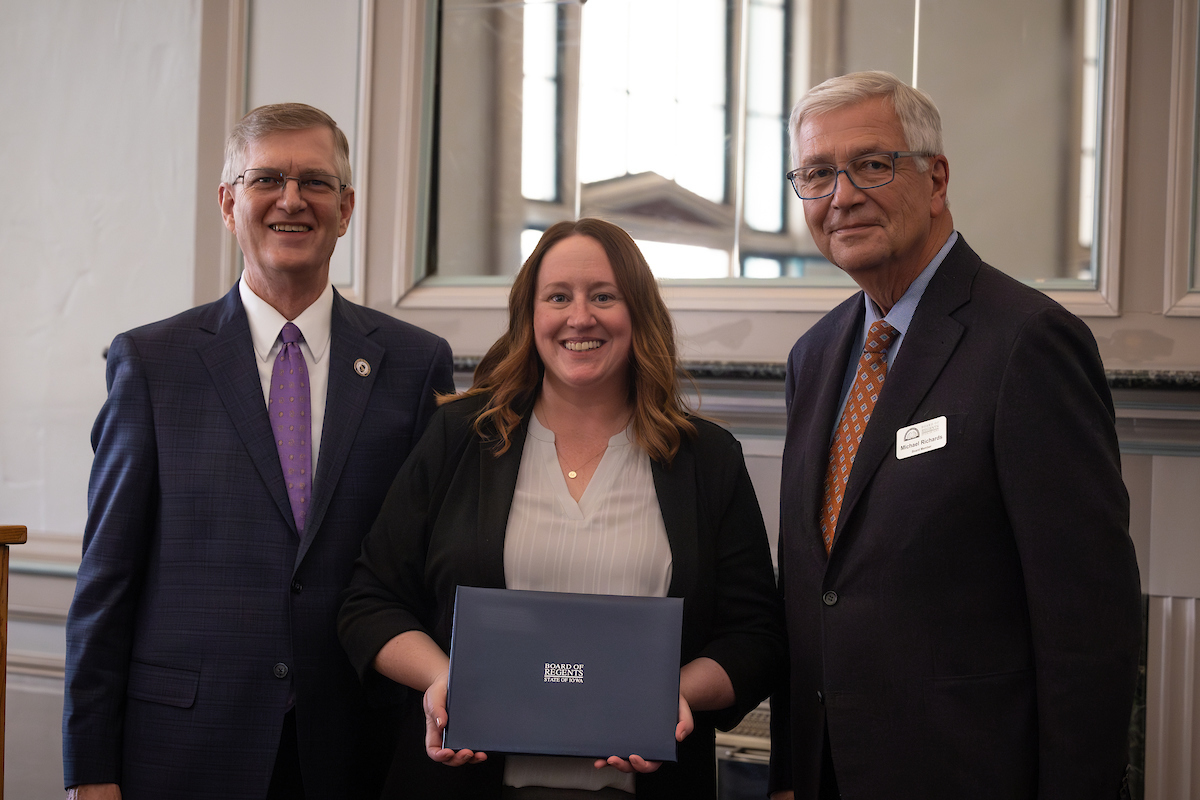 Melissa Engdahl with President Mark Nook and Board of Regents President Michael Richards