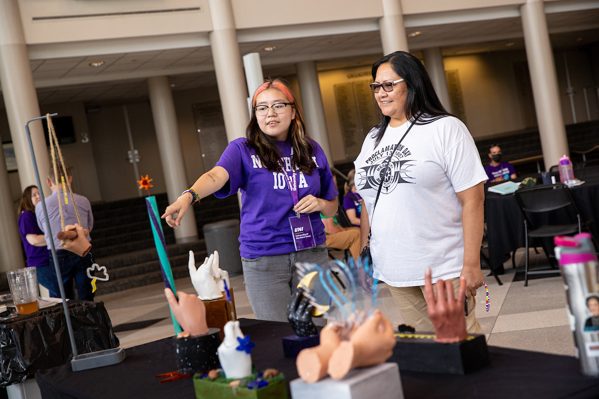 Meskwaki student shows off hand sculptures