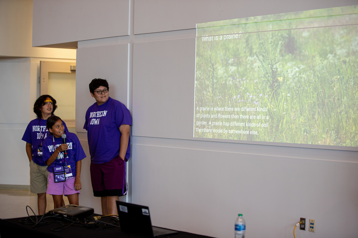 Meskwaki students presenting about the Meskwaki Summer Camp