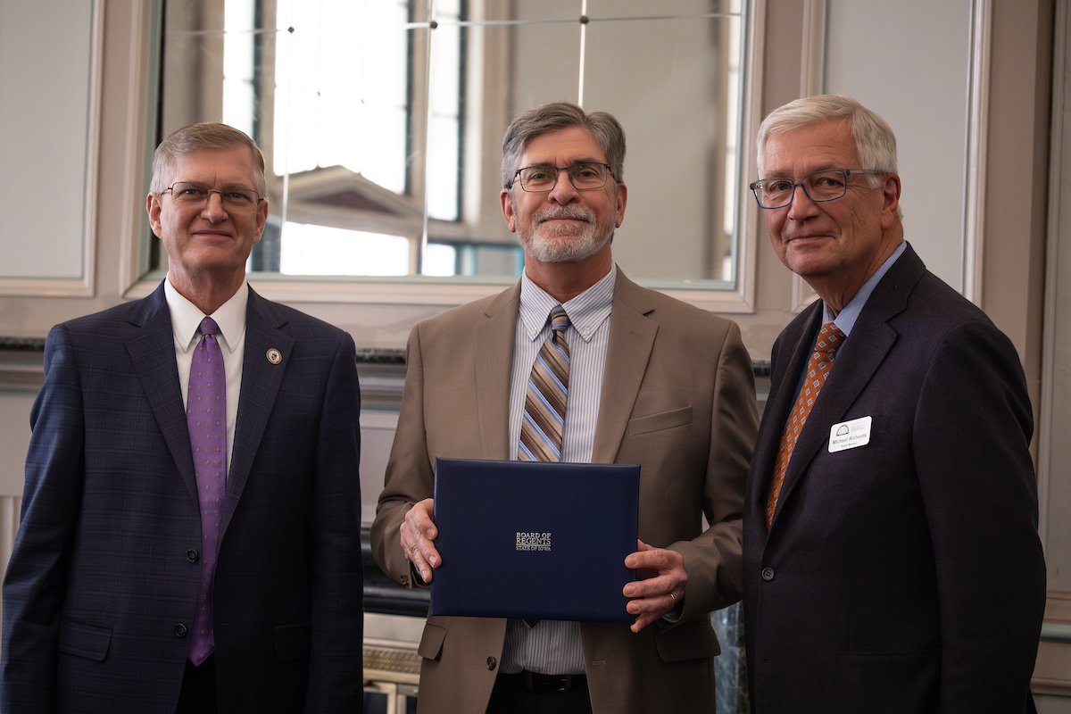 Nick Sullivan with President Mark Nook and Board of Regents President Michael Richards