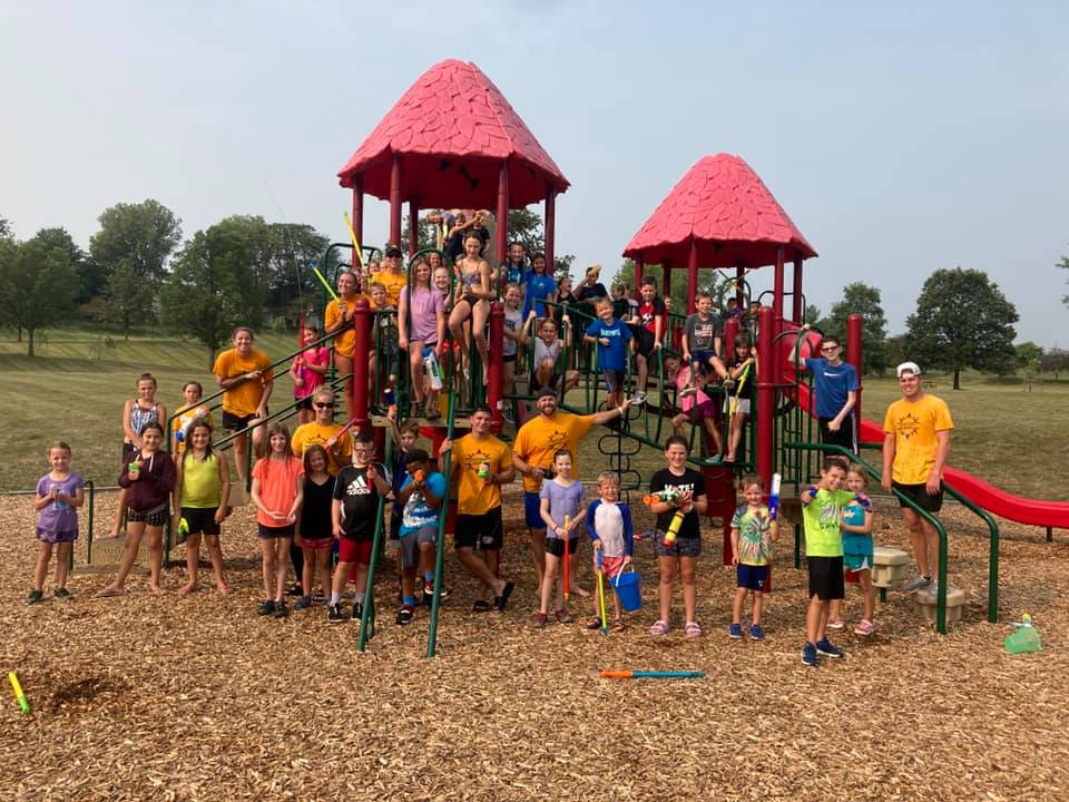 Day Camp Adventures students on playground