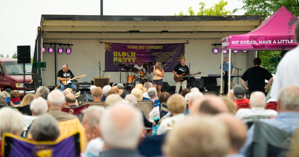 Crowd watches band perform at GBPAC Block Parties