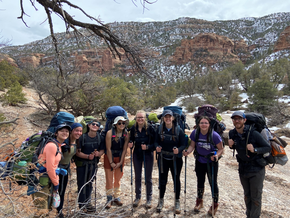 Eight UNI students on a hike on Adventure Trip