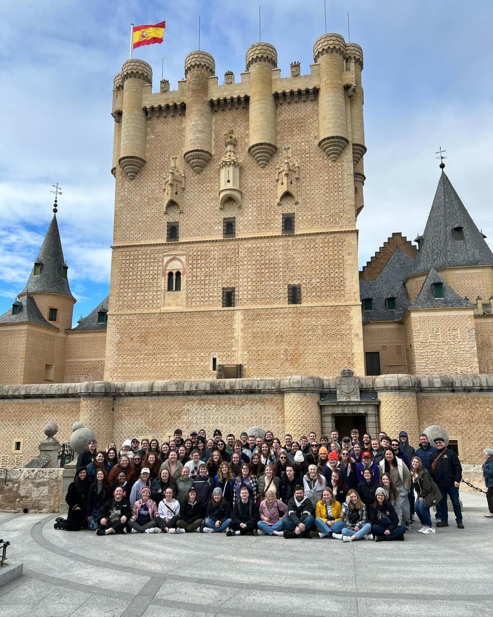 Panther Marching Band in front of a castle in Spain