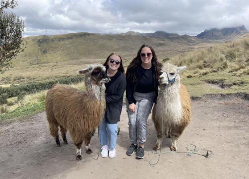 Emmalee Fannon and Cassey Bly with llamas