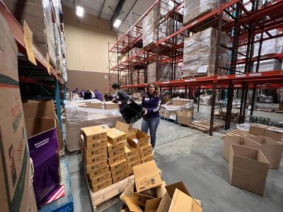 UNI staff members pack and organize donations for Northeast Iowa Food Bank