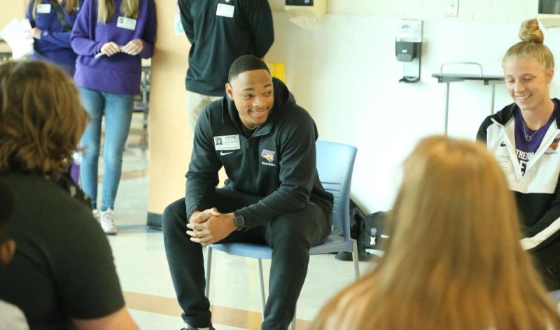 Kendall Robinson and Megan Witte speak at Bunger Middle School