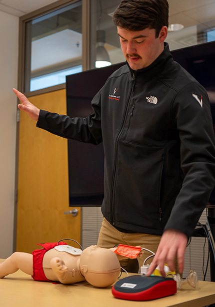 Jacob Kurt leads a hands-on CPR training session
