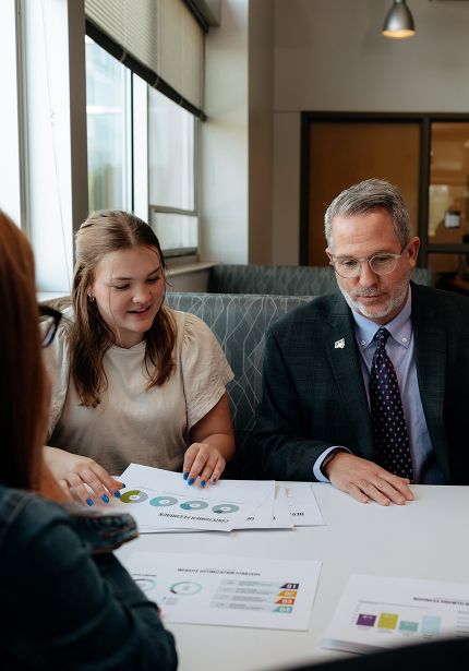 BCS staff members review data