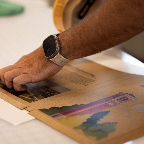 Graphic tech student getting packaging ready