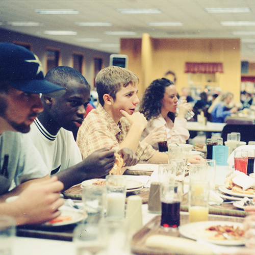 Students having a meal together