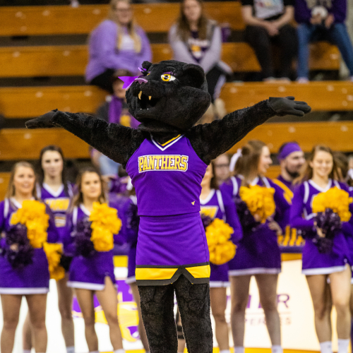 TK mascot in front of cheerleaders