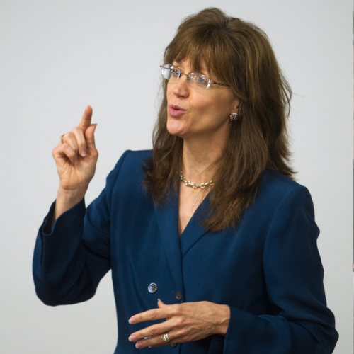 June 26, 2013: Wilson speaking to those gathered for the College of Business Administration Capstone event.