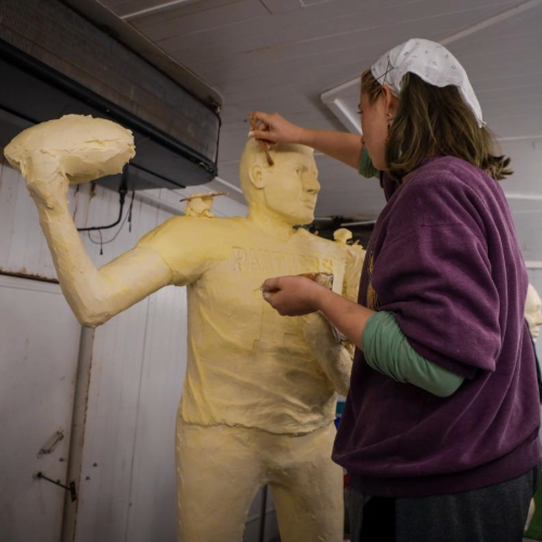 Hannah sculpting the Kurt Warner sculpture. 