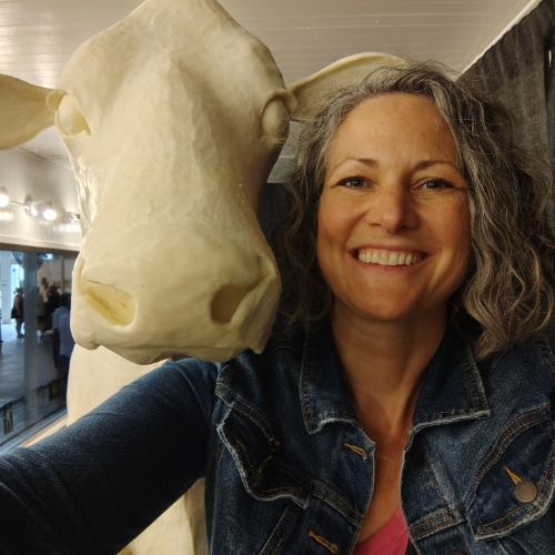 Sarah Pratt with the butter cow.