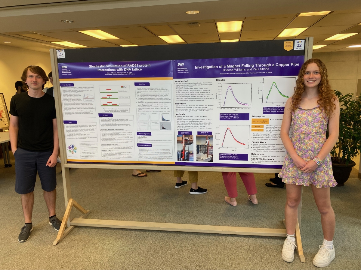 Blaine and Brianna Williams with research posters at Summer Undergraduate Research Program Symposium
