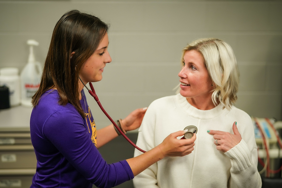 Student using a stethoscope