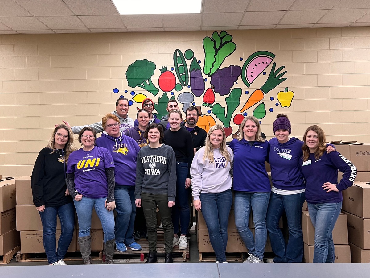UNI staff members pack and organize donations for Northeast Iowa Food Bank