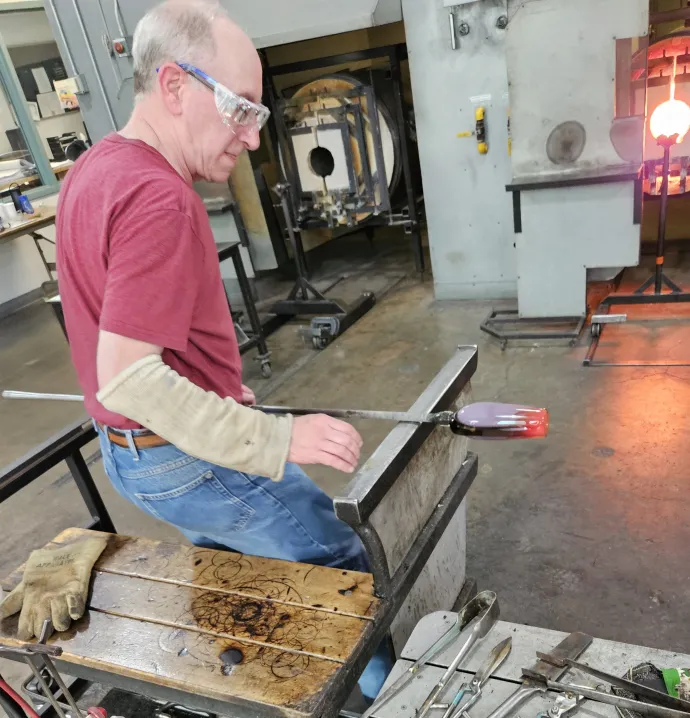 Bill Harwood blowing glass