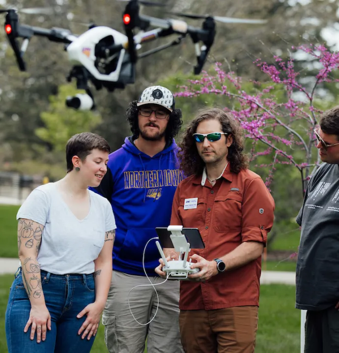 Geography students with a drone