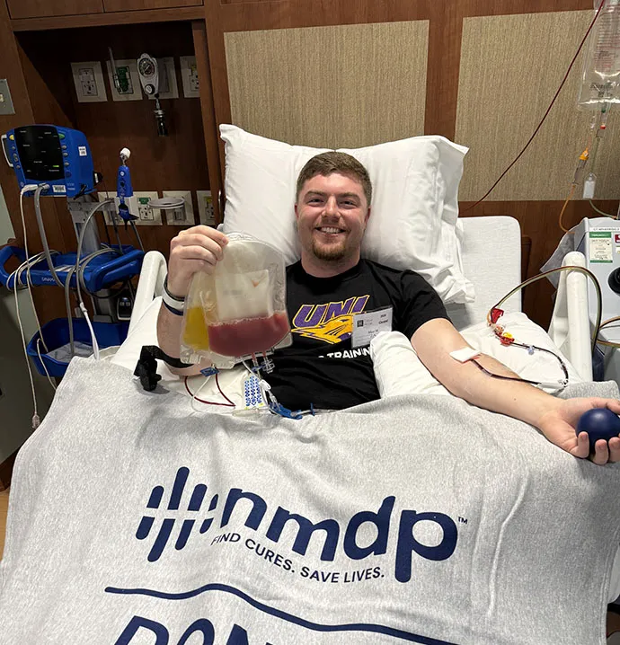 UNI student Max Mullis is pictured resting after donating stem cells to leukemia patient. 