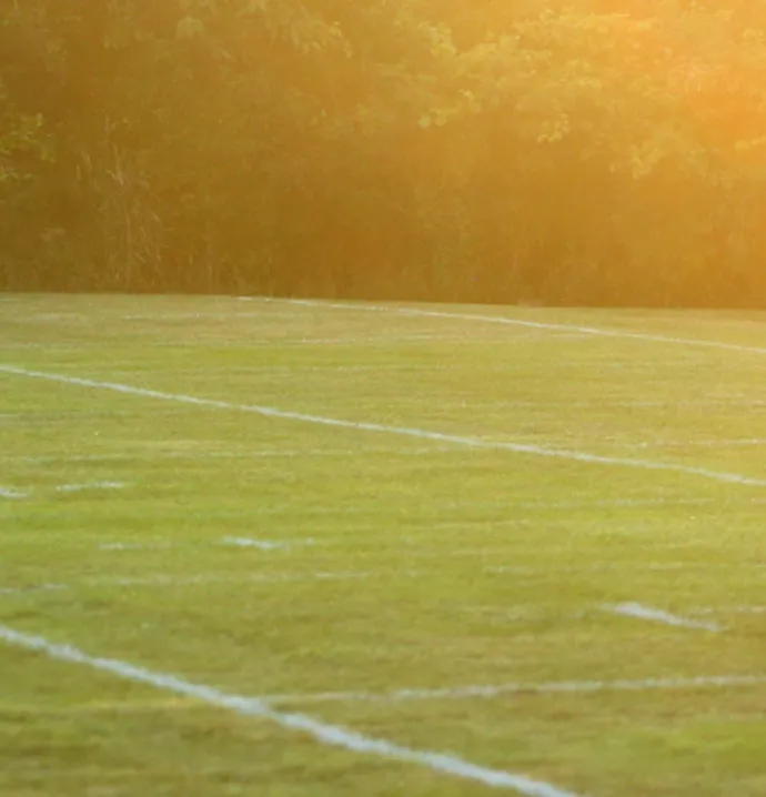 practice football field at sunset