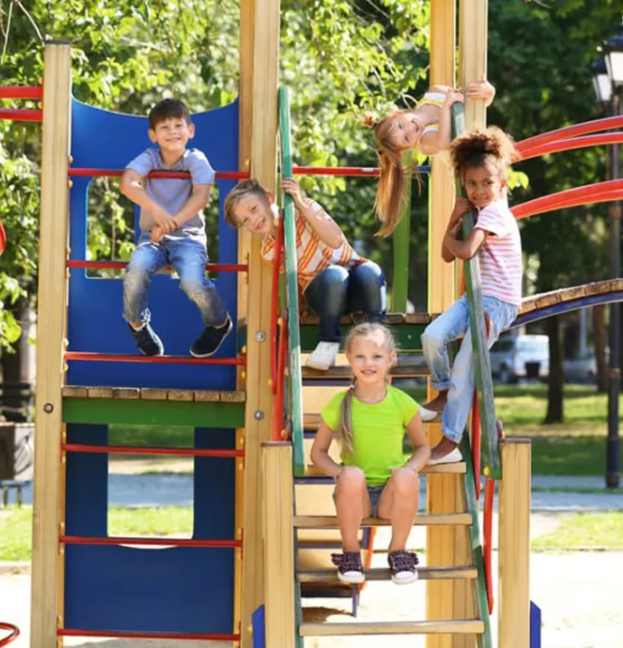 Children playing on a playground. 