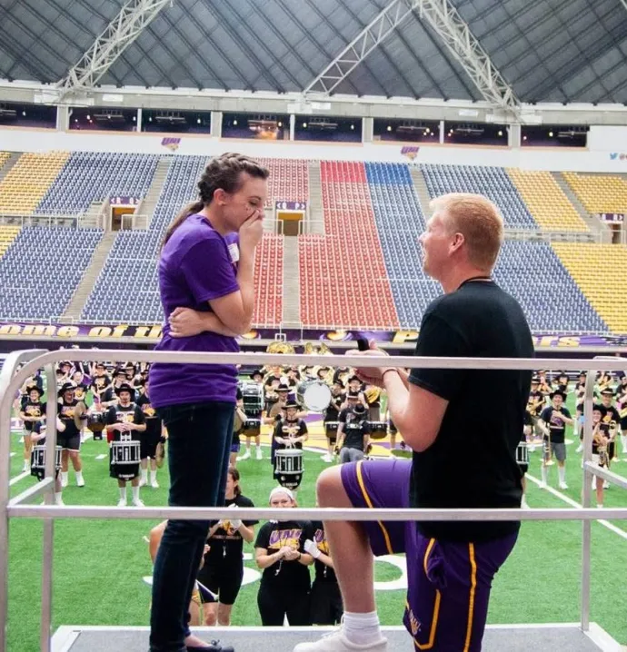 Young couple getting engaged in the UNI-Dome