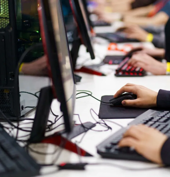 esports gamers at consoles 