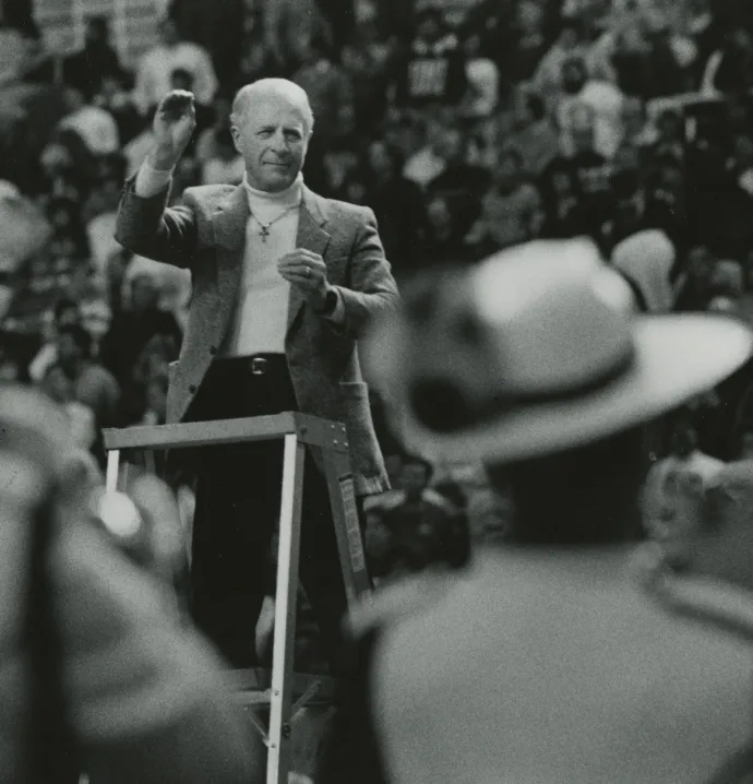 Arnold Grummer conducting in black and white