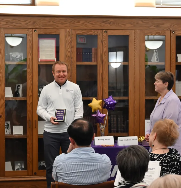 Julie Lanz and Stephanine Huffman present award.