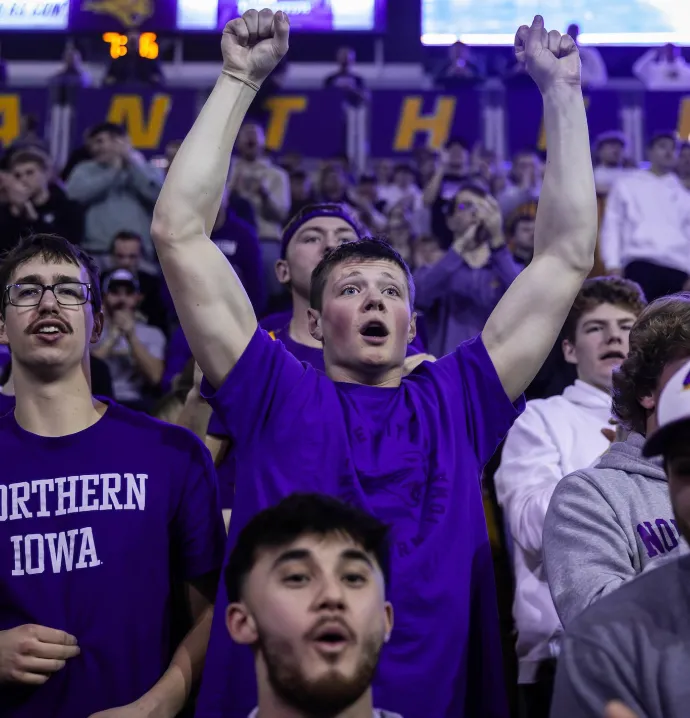 UNI students cheering on the Panthers in a packed McLeod Center