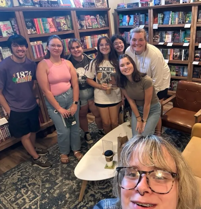 Students in UNI Book Lovers Club gather at local bookstore, The Nook. 