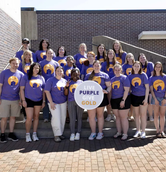 Students celebrating Live Purple Give Gold