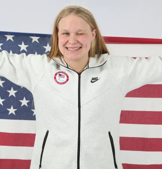 Olivia Chambers holding American flag